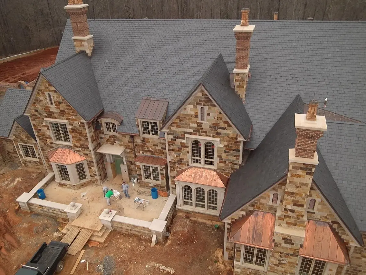 Craftsman Roofing Slate Roof Repair project in Tudor Village